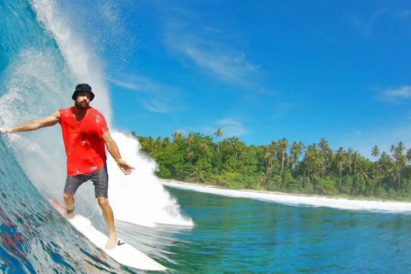 Man surfing Simeulue Island North Sumatra