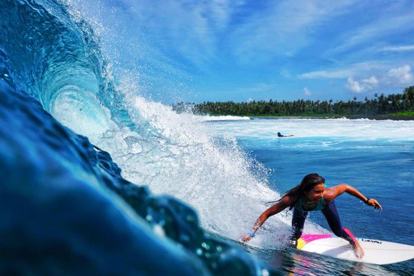 Girl Surfing During Surfcamp Simeulue Island